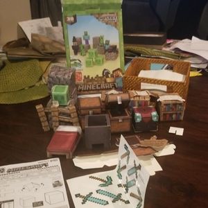 Minecraft paper craft, torch, plastic figurines.